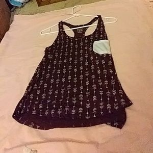 A purple razor back tank with arrows